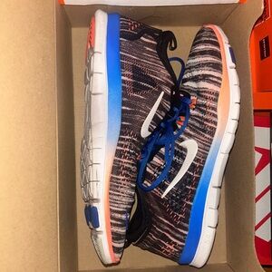 Orange and blue Nike sneakers